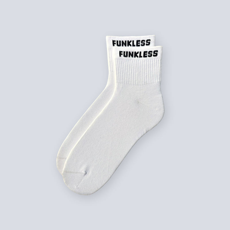 Pair of Arctic White Funkless Quarter socks shown upright